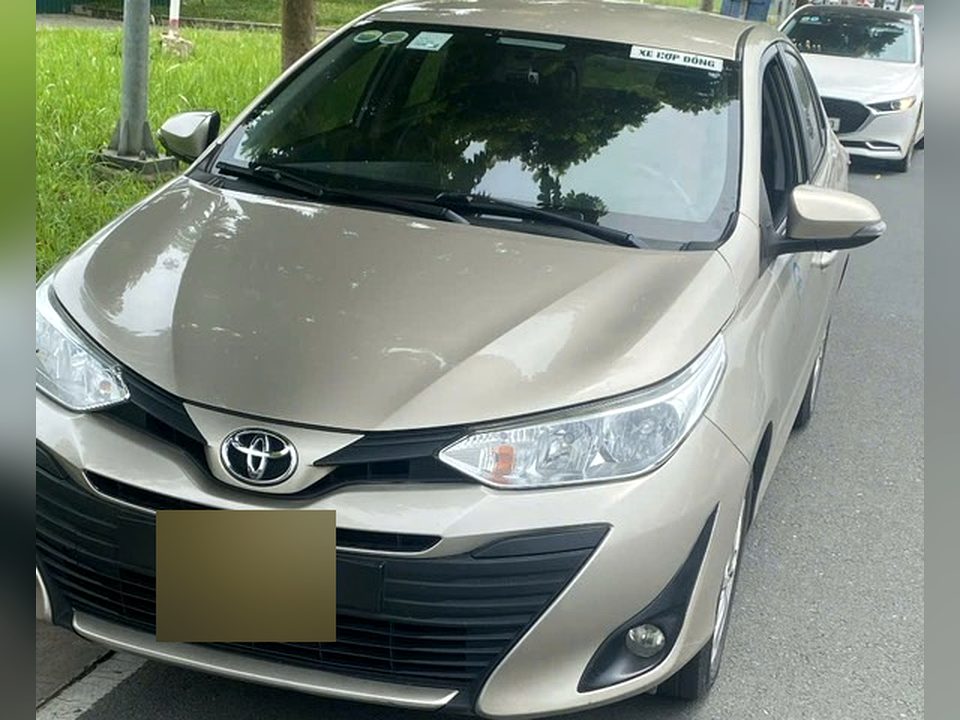 Toyota Vios sedan private car with driver in Vietnam